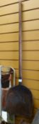An antique wooden malt shovel