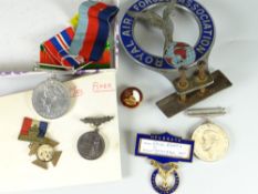 A vintage Royal Air Forces Association car grill badge, two WWII medals etc