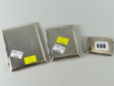 Three hallmarked silver cigarette cases