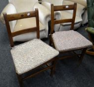 A pair of nineteenth century farmhouse chairs with inlay detail