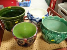 A vintage Majolica-style jardiniere base together with a collection of various planters
