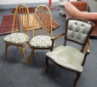 A pair of Ercol lightwood hoop back chairs & another