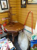 A decorative octagonal carved table together with a plate stand, Triang child's easel & a brass