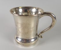 A hallmarked silver christening mug