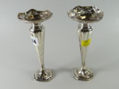 A pair of hallmarked silver bud vases