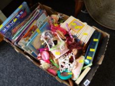 A selection of children's books, dolls, novelty toys etc