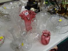 A parcel of glassware including decanter, vases, two cranberry glass vases & a small silver topped