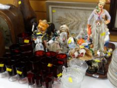 Tray of various ornaments & figures together with a parcel of red glassware