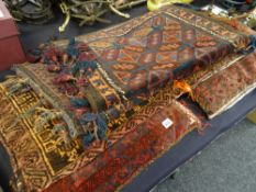 A selection of vintage Persian rugs & cushions