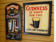 A small modern novelty mirror with Guinness Extra Stout together with a small modern wooden sign '