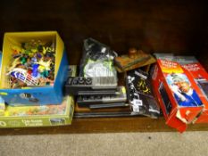 Two boxed forty channel walkie talkies and two others, a small selection of toys and games etc