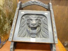 Vintage oak coal scuttle with lion mask carving to the front