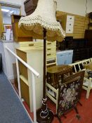 Vintage mahogany standard lamp and shade having a reeded column and carved detail