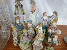 Group of biscuit porcelain and other figurines