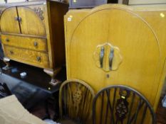 Compact two door wardrobe and a railback chest with two upper cupboard doors over two base drawers