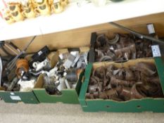 Four boxes of various rainwater system gutter clips, outlets and plumbing pipework etc