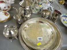 Three circular trays, a three piece teaset and other EP ware