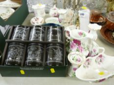 Selection of rose decorated ornamental china including an anniversary clock under dome and a boxed