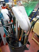 Plastic bin containing various long handled garden tools etc