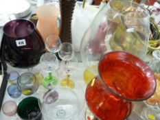 Mixed selection of drinks and ornamental glassware vases
