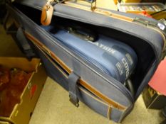 Two modern canvas suitcases