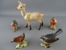 Beswick model of a deer and four British bird figurines, same manufacturer