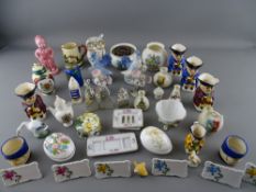 Quantity of Goss and other crested ware, a group of Toby jug miniatures and other ornamental cabinet