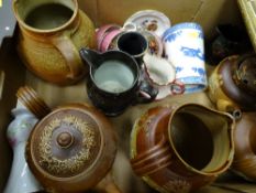 Two stoneware jugs and two teapots with applied decoration along with other decorative jugs and