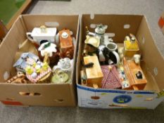 Collection of decorative teapots by Tony Wood etc in two boxes