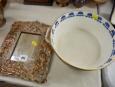 Good cast copper mirror frame adorned with cherubic figures and a MacIntyre blue and white gilt