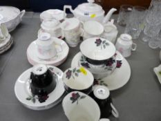 Queens fine bone china part teaset and a Royal Albert rose decorated part teaset