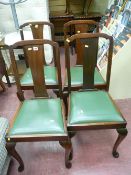 Parcel of four polished wood dining chairs with rexine seats