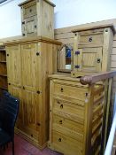 Mexican pine five piece bedroom suite of two door wardrobe, four drawer chest, dressing mirror and