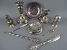 Small silver (a quantity) including a commemorative bowl, condiment items, squat candlesticks,