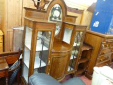 Circa 1900 mahogany inlaid display cabinet with central mirror