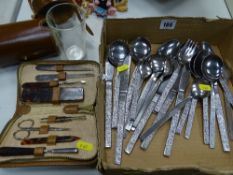 Loose quantity of stainless steel cutlery, a drinking glass in leather travel case and a zip cased