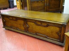 Reproduction Jacobean style polished linen chest