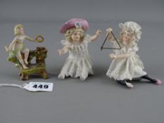 Three Victorian bisque porcelain cabinet figurines