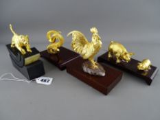 Four gilt metal desktop animal figurines by Risis