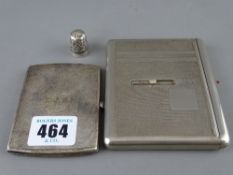Silver cigarette case with engine turned decoration, an unmarked white metal example with sliding
