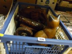 Two carved animals and a cannon