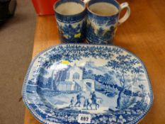 Two blue and white tankards and a platter