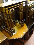 Nest of three mahogany coffee tables with spindle legs and an Edwardian octagonal mahogany