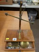 Set of mahogany and brass weighing scales and weights