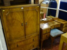 Reproduction walnut tallboy with two doors and two base drawers and a kneehole curved front dressing