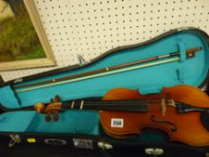 Modern child's violin in case with label 'Made in Shanghai'