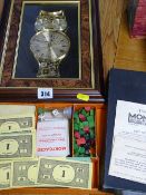 Novelty owl framed clock and a vintage Monopoly set
