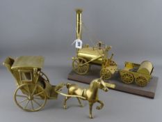 Brass model of Stephenson's Rocket on a plinth with a horse and sedan carriage