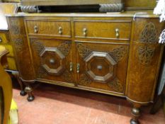 Polished railback sideboard with two drawers and two cupboard to the centre with bold panels