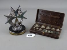 Bakelite cased set of gram weights with tweezers and a presentation award in the form of a Maltese